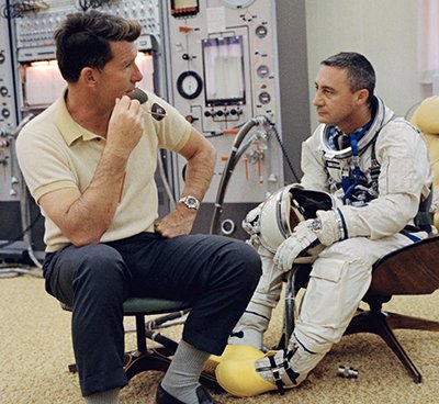 Astronaut Gus Grissom preparing for the Gemini III mission wearing his Omega Speedmaster, 1964