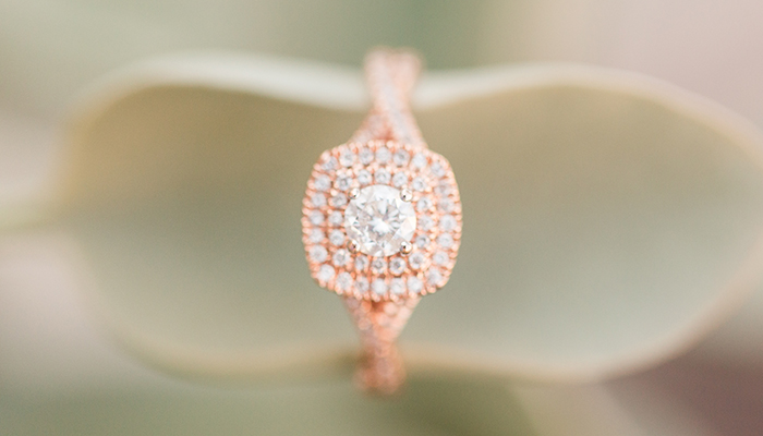 Rose gold engagement ring with two diamond halos