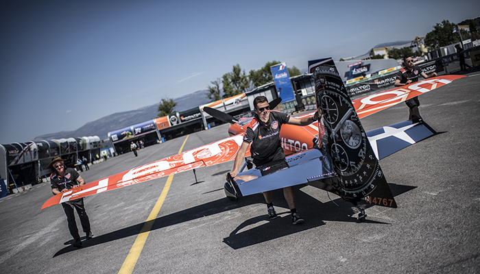 Members of Team Hamilton push the airplane of Nicolas Ivanoff of France during training day at the second round of the Red Bull Air Race World Championship in Cannes, France on April 20, 2018.