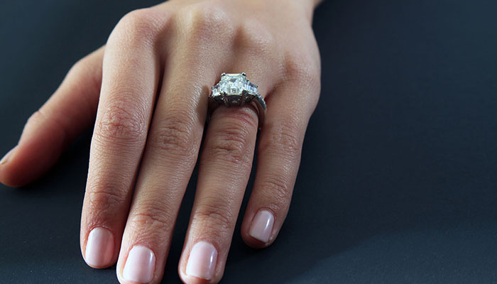 Woman's hand with wedding ring