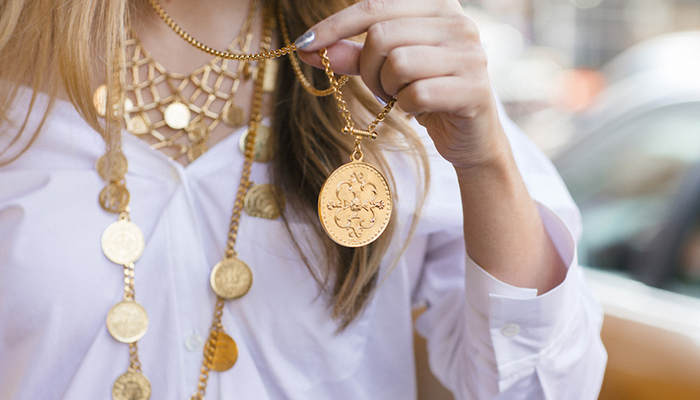 Fashion blogger wears Ben Amun jewelry with coin charms