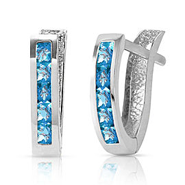 1.2 CTW 14K Solid White Gold Oval Huggie Earrings Blue Topaz