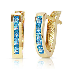 1.2 CTW 14K Solid Gold Oval Huggie Earrings Blue Topaz