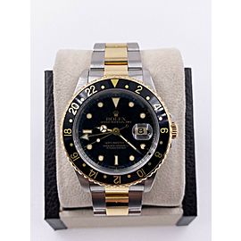 Rolex GMT Master II 16713 Black Dial 18k Yellow Gold Stainless Steel Watch