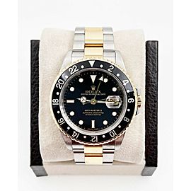 Rolex GMT Master II Black Dial 18K Yellow Gold Stainless Steel