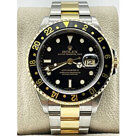 Rolex GMT Master II 16713 Black Dial 18K Yellow Gold Stainless