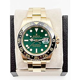 Rolex GMT Master II Green Dial Black Ceramic Bezel 18K Yellow Gold