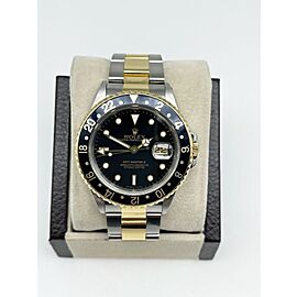 Rolex GMT Master II 16713 Black Dial 18K Yellow Gold Steel