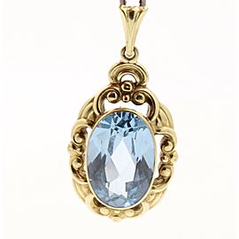 14k Yellow Gold Oval Blue Topaz Ornate Pendant Charm