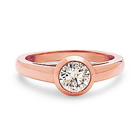 14K Rose gold bezal set cartier style solitaire diamond engagement ring.