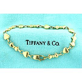 Tiffany & Co. Bracelet Hearts Ribbons Bows 18k Yellow Gold 7.25" Heavy 17g Charm