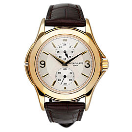 Patek Philippe Calatrava Travel Time 18K Yellow Gold Mens Watch