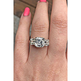 Amazing Platinum Three-stone Engagement Ring features 5.07ct. TWD