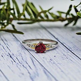 Yellow Gold Engagement ring featured with Heart Shaped Ruby and 0.15ct Diamonds