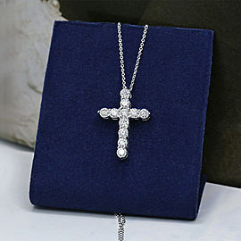 14k White Gold Cross Pendant features 11 Round cut diamonds in 2.15ct of TCW