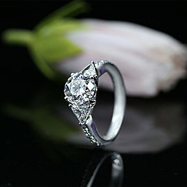 Three-Stone Engagement Ring with Center 2.34ct. Round Diamond