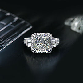 18k White Gold Engagement ring features 6.45ct. Diamonds