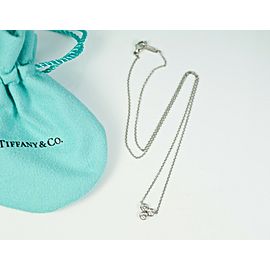 Tiffany & Co Platinum 3 Diamond Bezel Set Swirl Flower Pendant