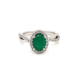 Oval shaped Emerald and Diamonds Twist Shank Ring In 14K White Gold