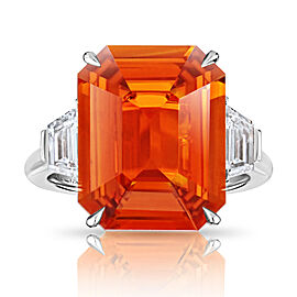 David Gross Emerald Cut Orange Sapphire with two Trapezoid Step Cut Diamonds in a Platinum ring