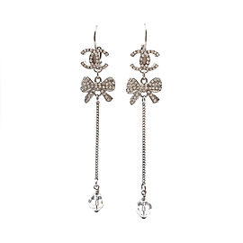 Chanel CC Silver Tone Crystal Bow Dangle Lever Back Piercing Earrings