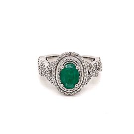 Oval-Cut Emerald and 1.00 Ct. Tw. diamond Criss-Cross Shank Ring in 14K White Gold