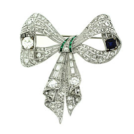 Platinum with 4.15ctw. Diamond and 0.75ctw. Sapphire. Ribbon Brooch-Pendant