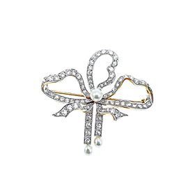 Antique Platinum-Topped Gold, Diamond and Pearl Bow Brooch