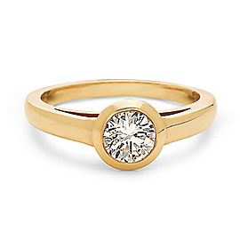 14K Yellow gold bezal set cartier style solitaire diamond engagement ring.