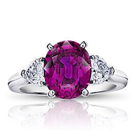 David Gross Oval Pink Sapphire with two Heart Diamonds in a Platinum ring