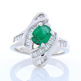 1.00 Carat Oval Emerald and Invisible Set Diamond Cocktail Ring in 14 Karat Gold