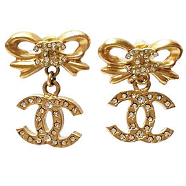 Chanel Gold Tone Metal & Crystal Ribbon Bow CC Dangle Piercing Earrings